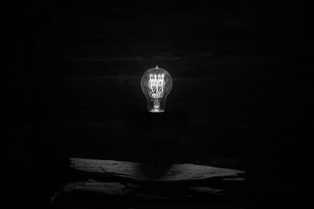 a light bulb in the dark - 9 Creativity Tips for Content Creators - Lessons from Austin Kleon Books