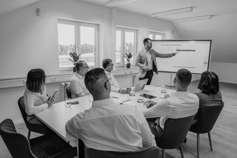 people in a workplace - learn about managing multiple clients as a freelancer