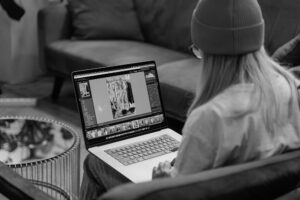 A Person Editing Raw Photos - Basics of RAW Photo Editing