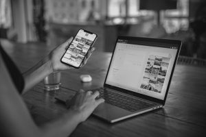 a person looking at photos, preparing for batch editing