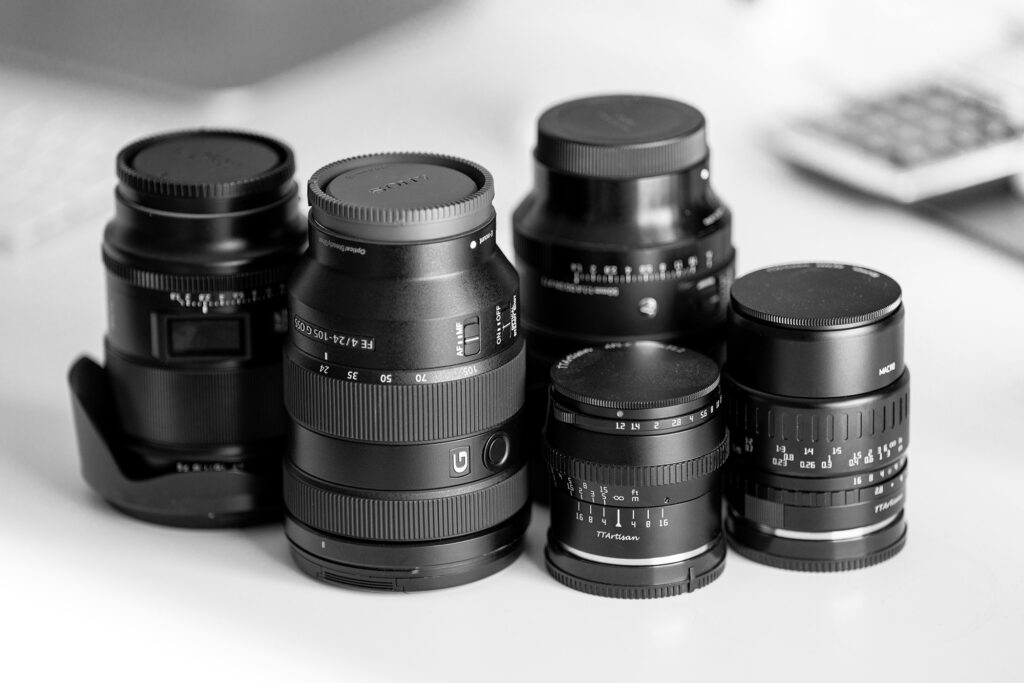 a collection of lenses - Best Lenses for Every Type of Photography and Video