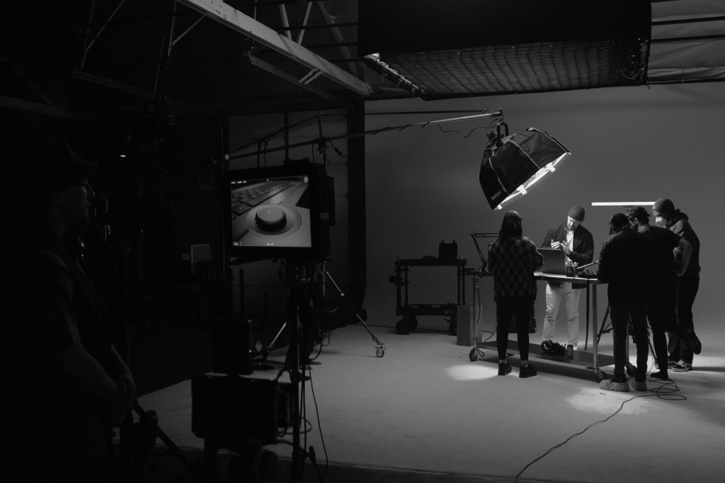 several people doing a test shoot in studio