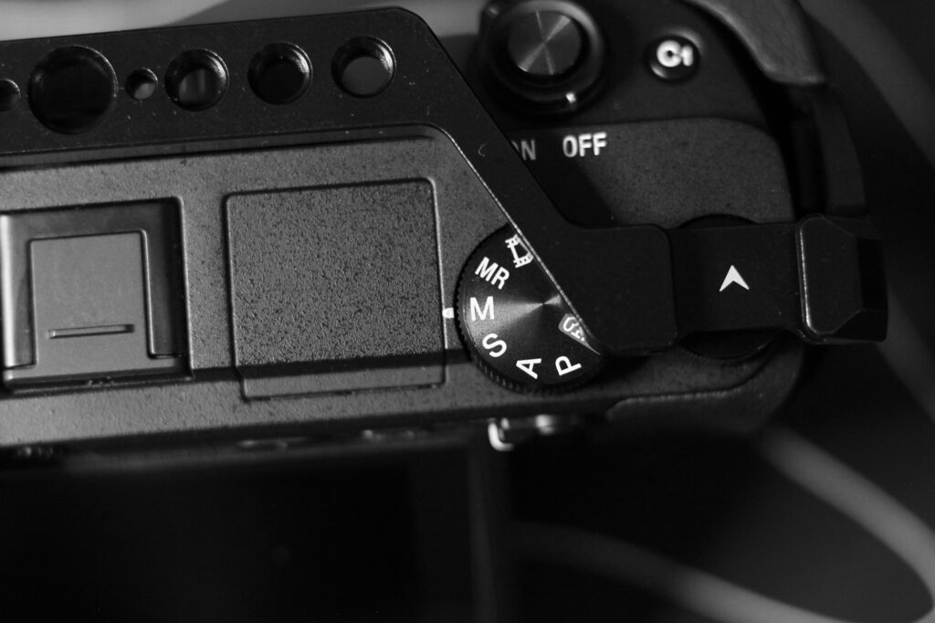 camera with a dial to switch modes - How to Shoot in Manual Mode for the First Time (Step-by-Step)