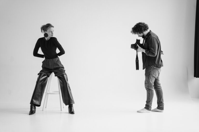 Natural Light vs Flash Photography: Which Is Better (and When to Use Each) - man with camera photographing a woman