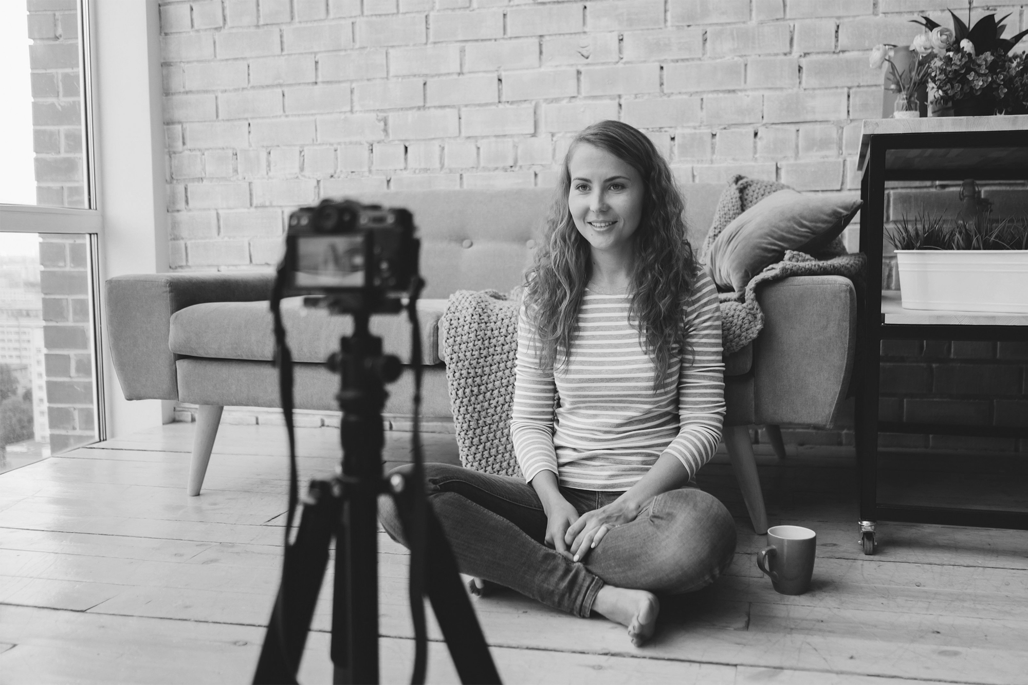 person filming herself - learn about storytelling for personal branding
