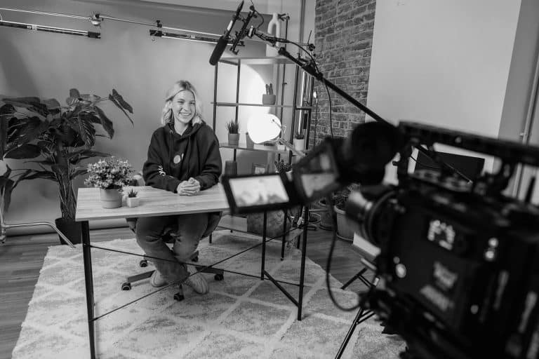 talking person being recorded with a camera - learn about storytelling in content marketing