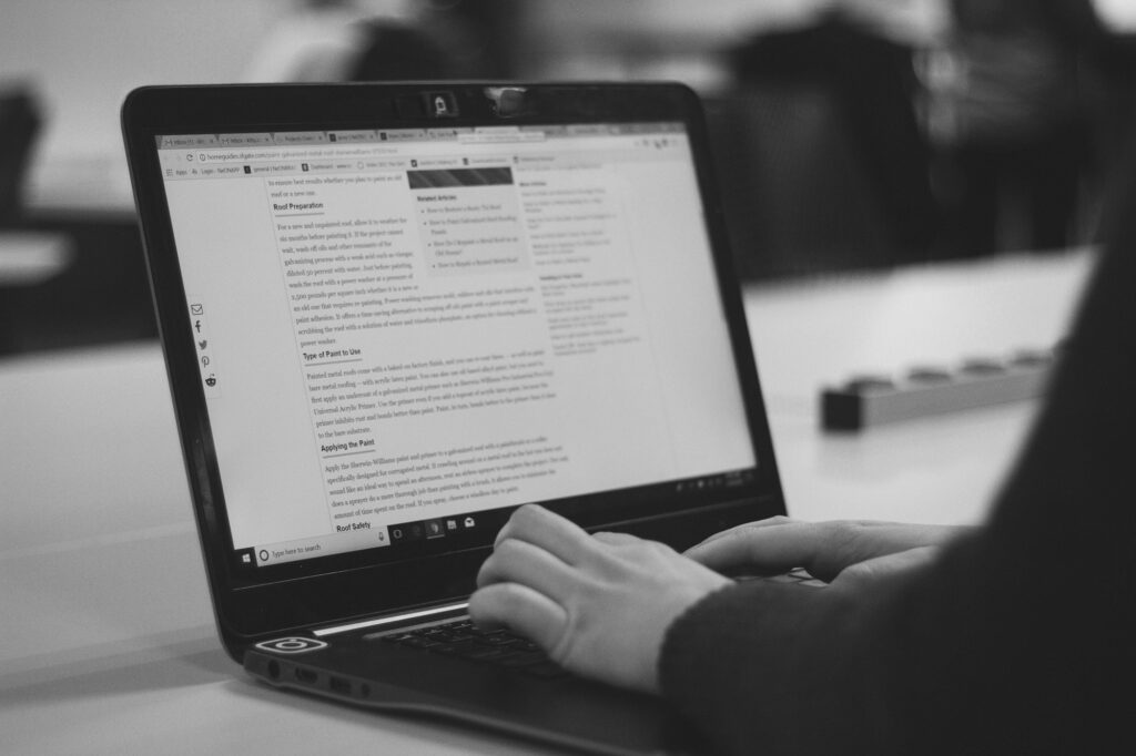 person working with a laptop - What to Look for in a B2B Freelance Writer