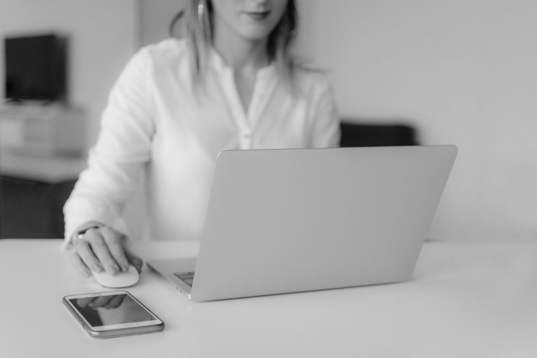 a person working with a computer, choosing what to send to their audio editor