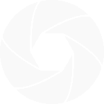 Hamed Media - logo - white - shaped like a camera lens iris