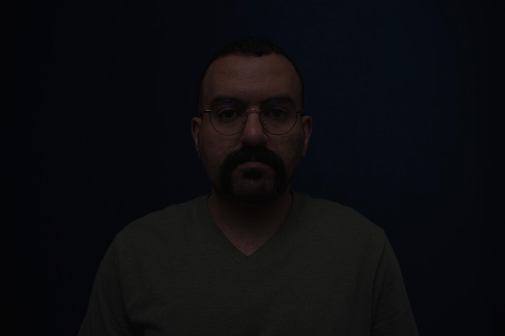 dark and underexposed photo example of a person
